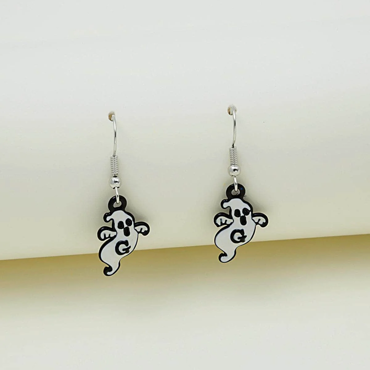 Sophisticated Black White 'G' Ghost Drop Earrings Refined