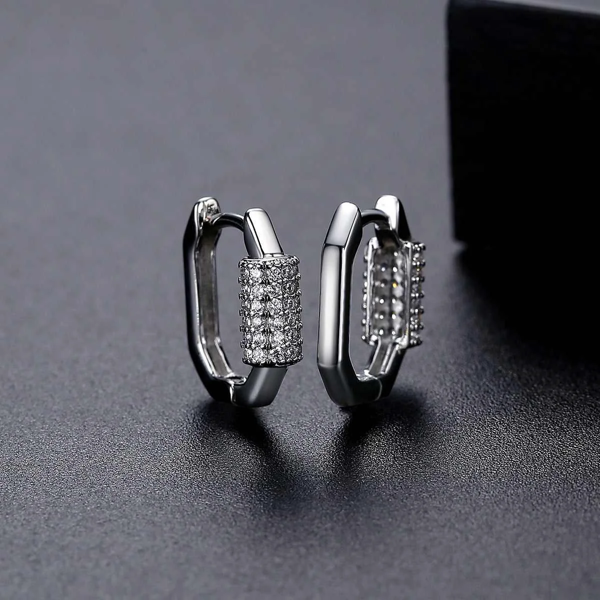 Functional Cubic Zirconia Silvertone Coil Oval Huggie Earrings Enhanced
